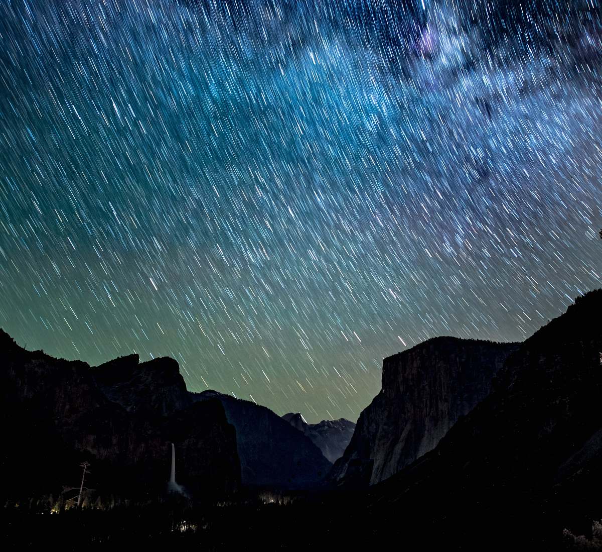 night silhouette of mountains under night sky with stars astronomy